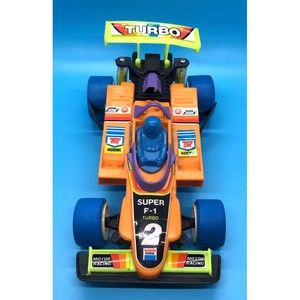 Vintage Friction Vehicle Super F-1 Turbo #2 Toy Race Orange Car With Shocks